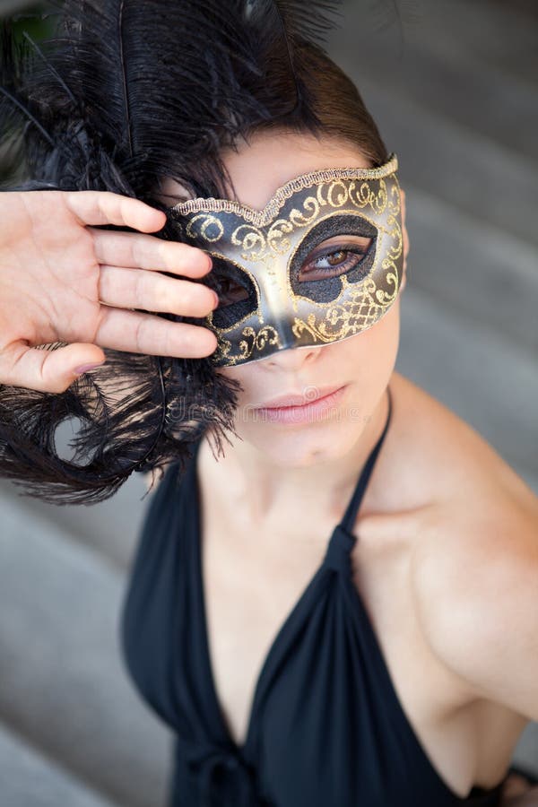Sexig flicka i den venetian maskeringen arkivfoto Sexig flicka i den venetian maskeringen arkivfoto