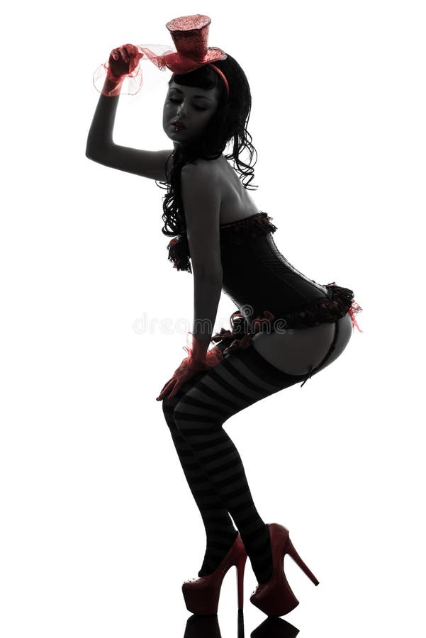 One caucasian woman stripper showgirl in silhouette studio isolated on white background. One caucasian woman stripper showgirl in silhouette studio isolated on white background