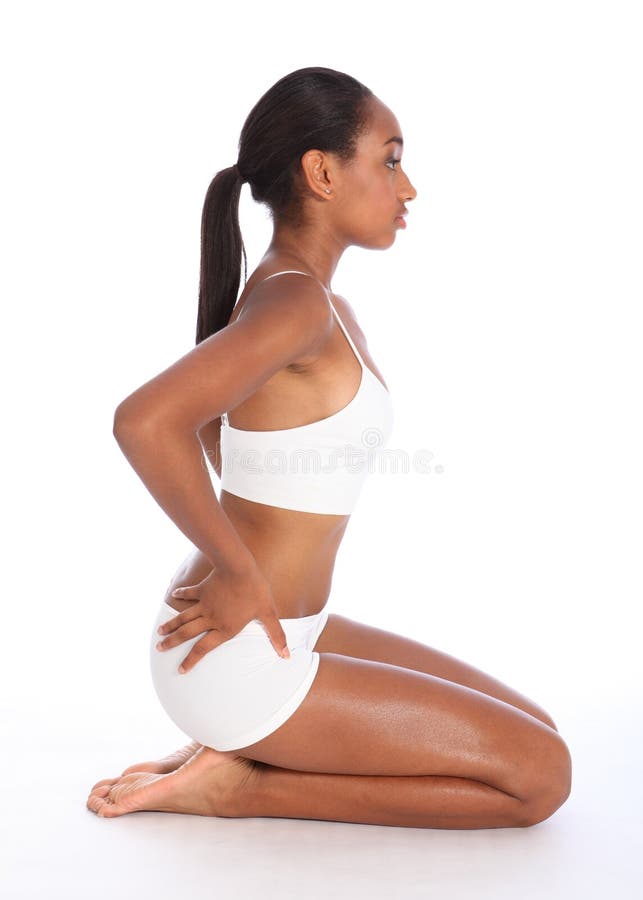 Body of a young and fit woman in white sporty lingerie Stock Photo