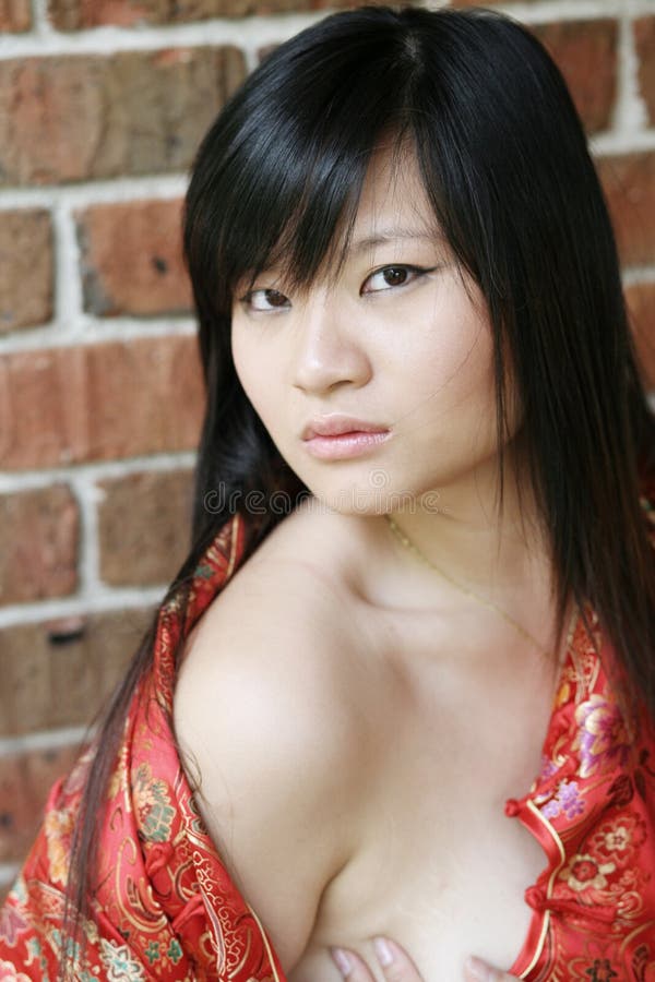 Asian girl looking at viewer stock photos