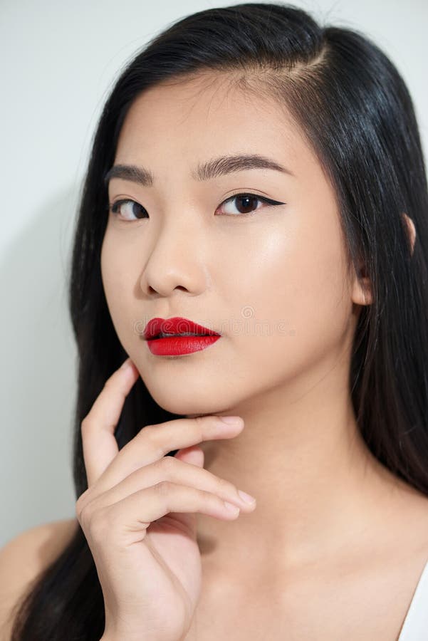 Asian Woman In Satin Dress With Red Lips Touching Neck Isolated On White Stock Image Image Of