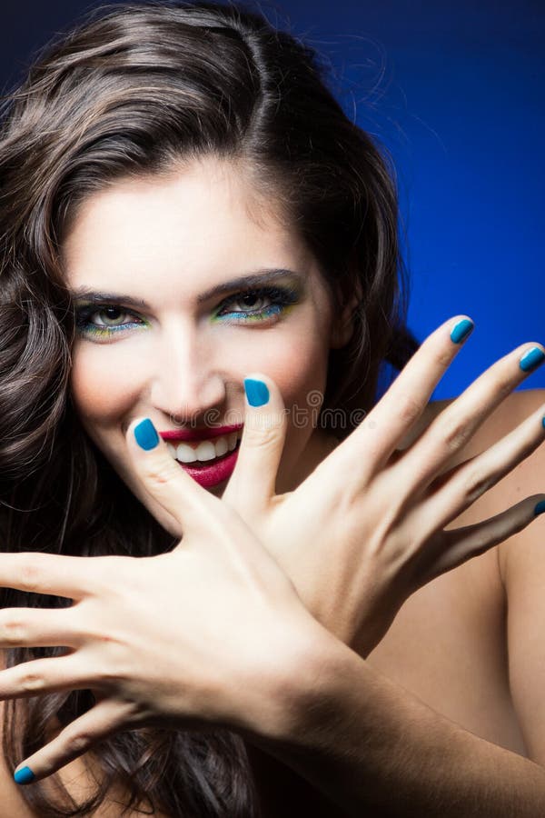 Beauty Girl With Red Lips And Blue Nails Stock Image