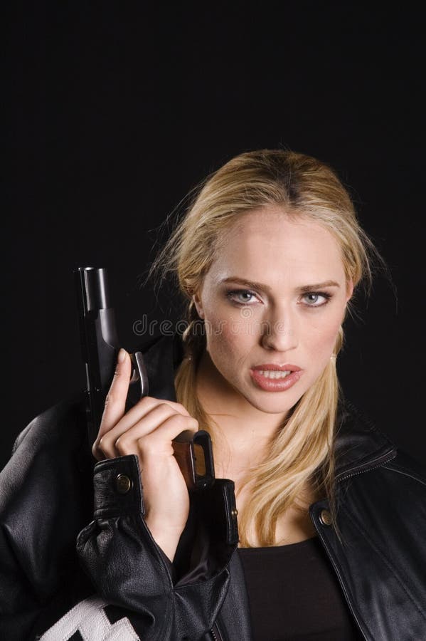 Blond with Gun in Leather Jacket Stock Photo - Image of pony, semi: 2068034