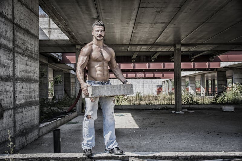 construction worker shirtless with muscular royalty free stock image.