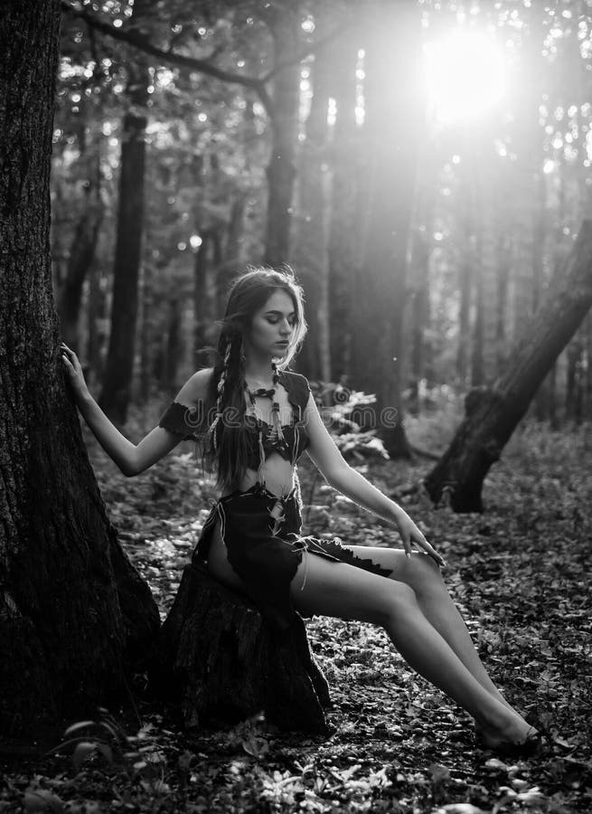 Sexy dreaming. cougar female. ethnic tribal fashion. deep forest. wild woman in forest. amazon woman. sexy witch. sexy