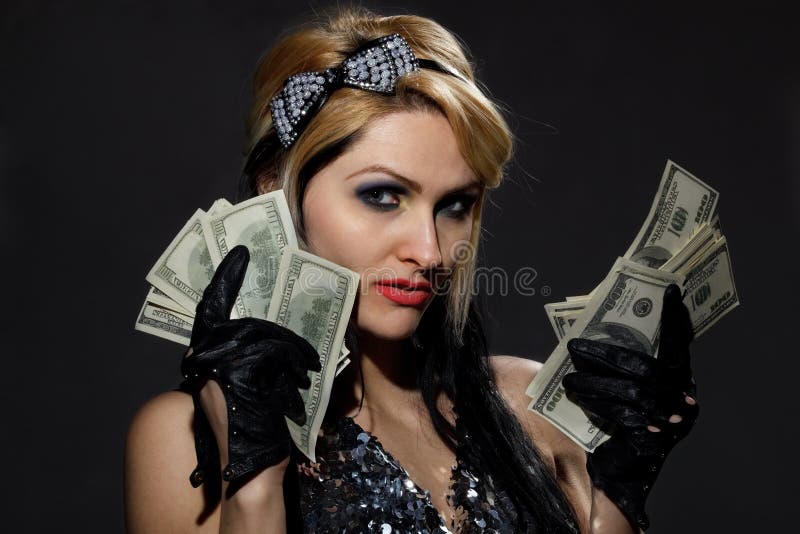 female with fan of dollars