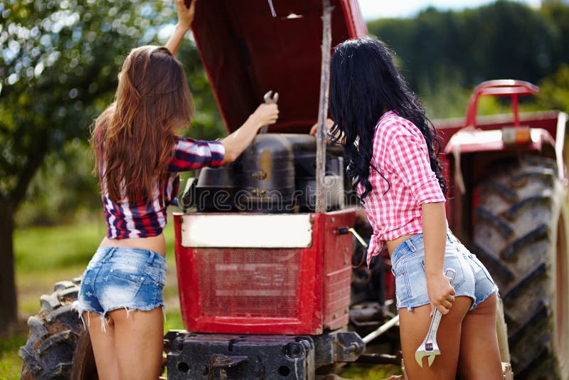 Female Farmers Fixing The Tractor Stock Photography Image 36440632