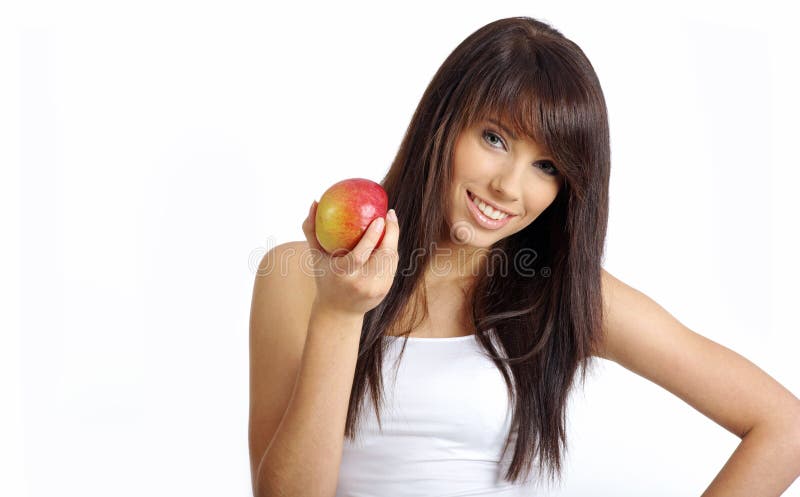 Girl with apple stock photo