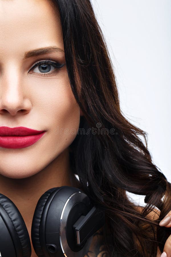 girl DJ in top and pantyhose on a white background