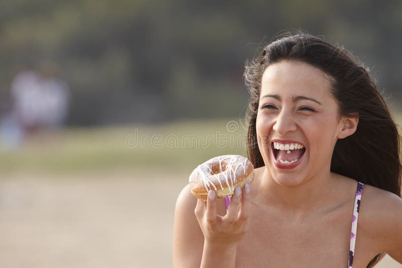 Girl laugh with Doughnut