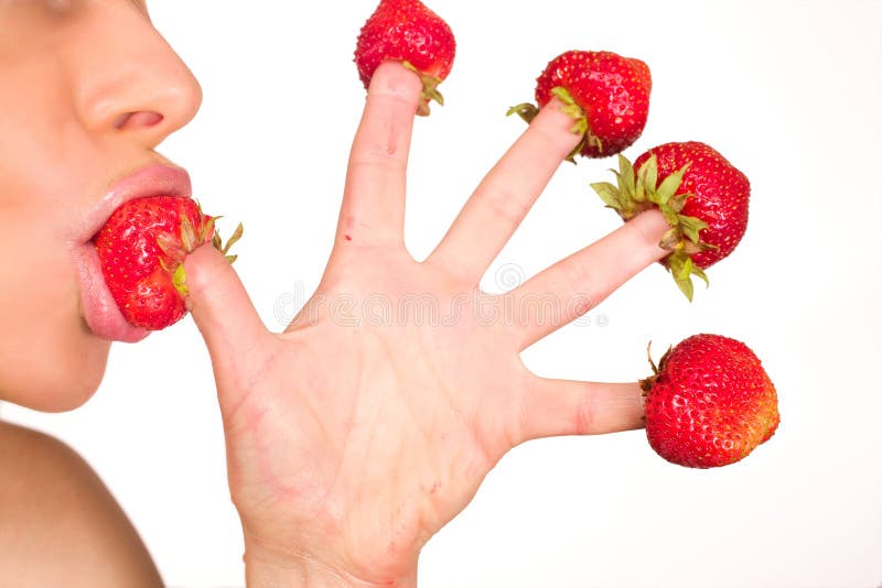 girl with red strawberry isolated on white