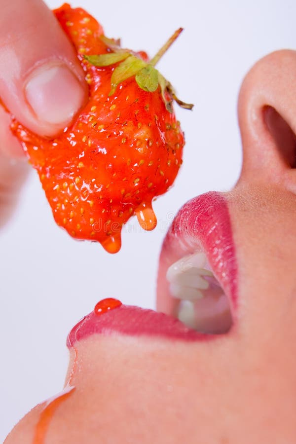 girl with red strawberry isolated on white