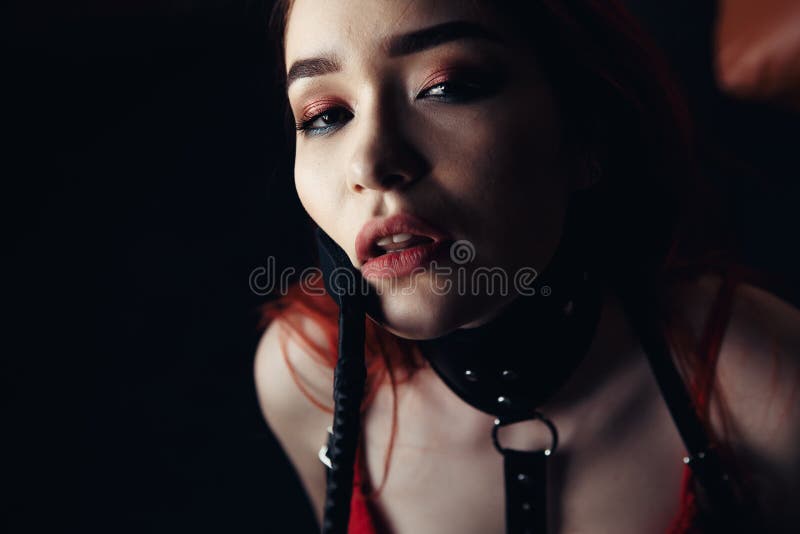 Girl Slave in Red Lingerie picture