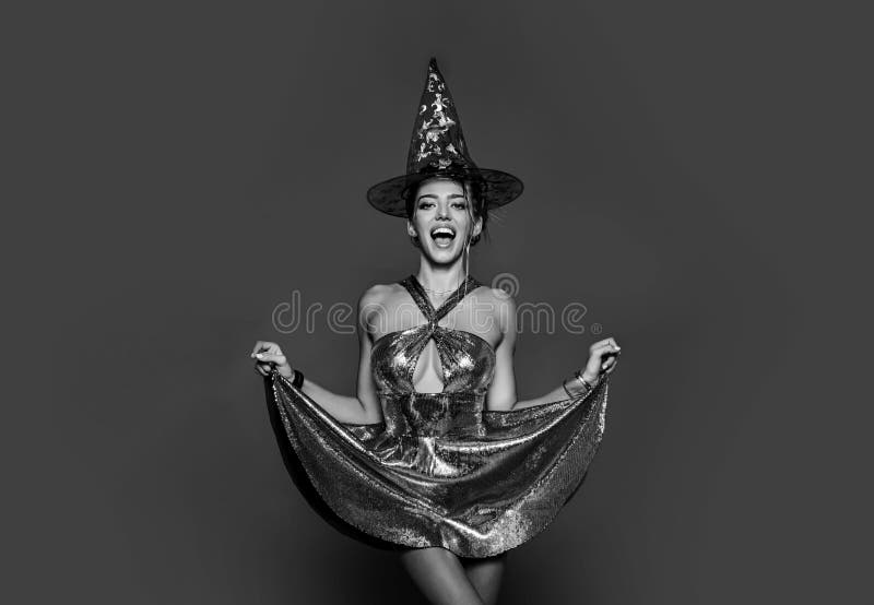 Sexy halloween Witch. Sexy woman. Halloween party. Expression face and crazy people. Happy people having fun. Surprised. Woman stock images Sexy halloween Witch. Sexy woman. Halloween party. Expression face and crazy people. Happy people having fun. Surprised. Woman stock images