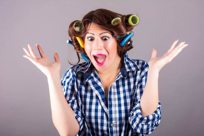 Portrait of housewife with curlers. Portrait of housewife with curlers