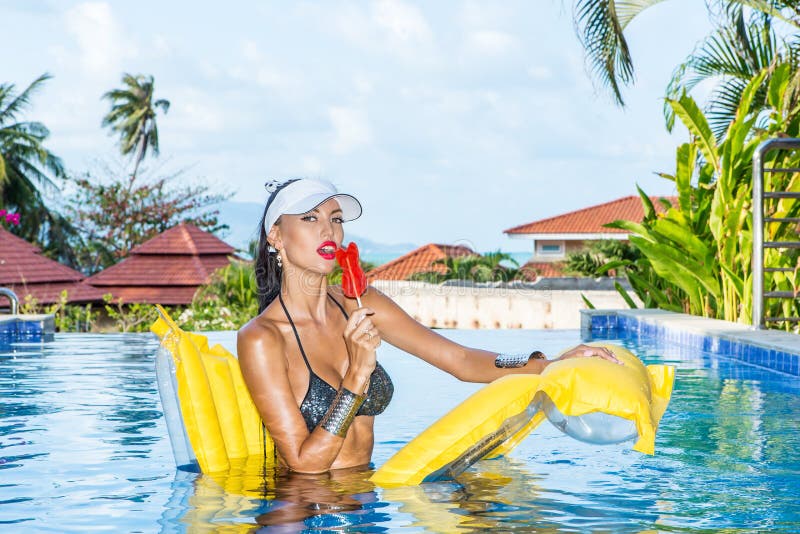 Free Photos. lady with long legs at the pool. 