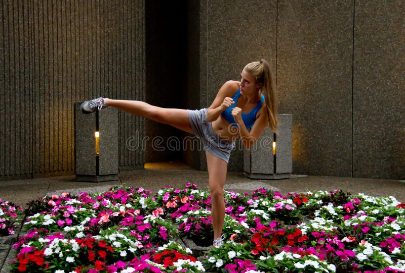mixed-martial arts (MMA) woman kicking stock photo mixed-martial arts (MMA) woman kicking stock photo