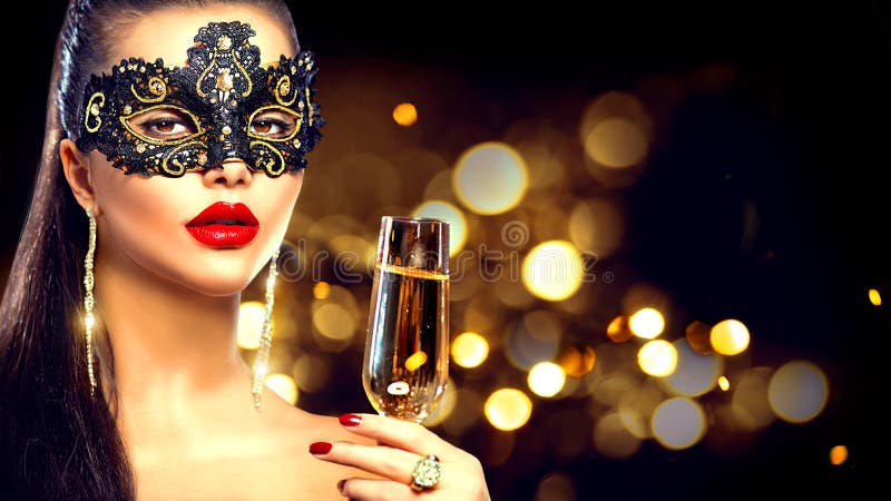 model woman with glass of champagne wearing venetian masquerade mask. model woman with glass of champagne wearing venetian masquerade mask