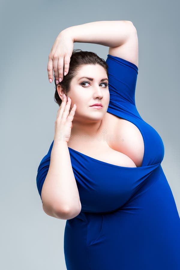 Plus Size Fashion Model in Blue Dress with Neckline, Fat Woman on Gray Body Positive Concept Stock Photo - Image of blue, cleavage: 204696138