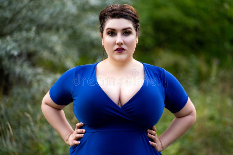 Plus Size Fashion Model in Blue Dress with a Deep Neckline Outdoors,  Beautiful Fat Woman with Big Breasts in Nature Stock Image - Image of  clothing, model: 194296889