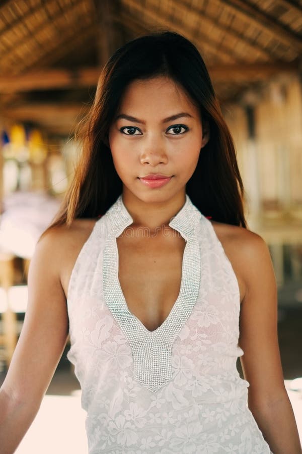 Portrait Of A Beautiful Asian Girl On Summer Vacation Stock Photo