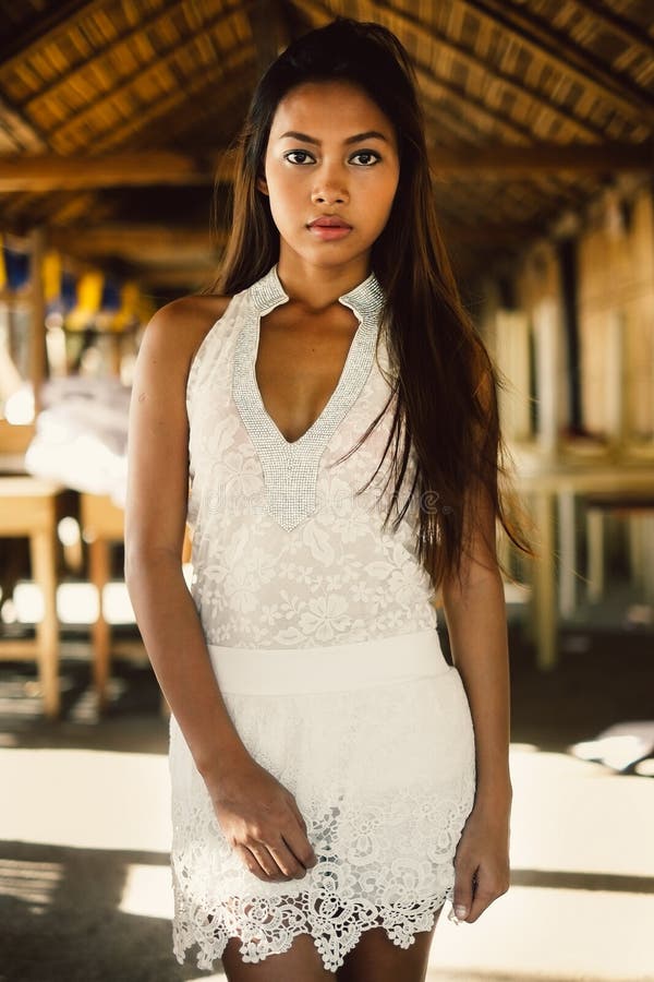 portrait of a beautiful Asian girl on summer vacation