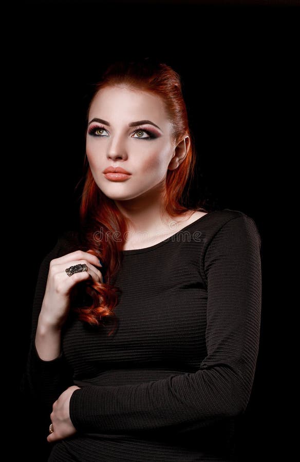 Redhead Girl In Black Dress On White Background Beauty Stock Image