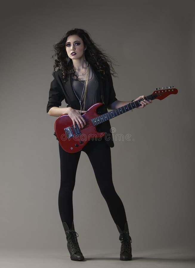 rocker chic in black with red guitar