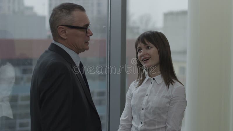 secretary and her boss flirting in office