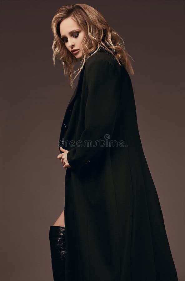 seductive blonde girl in underwear and black coat royalty free stock images seductive blonde girl in underwear and black coat royalty free stock images