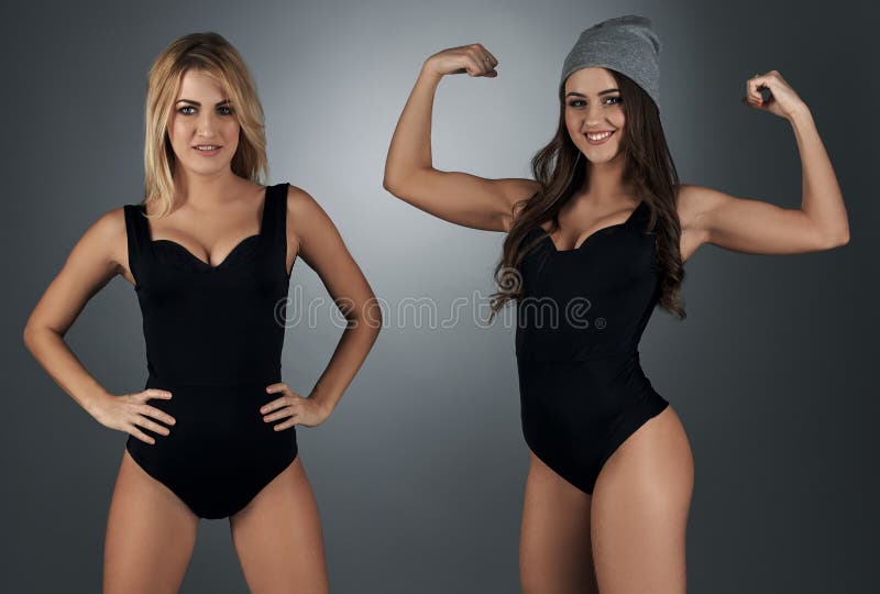 Young girls in sexy black swimsuits pose in studio