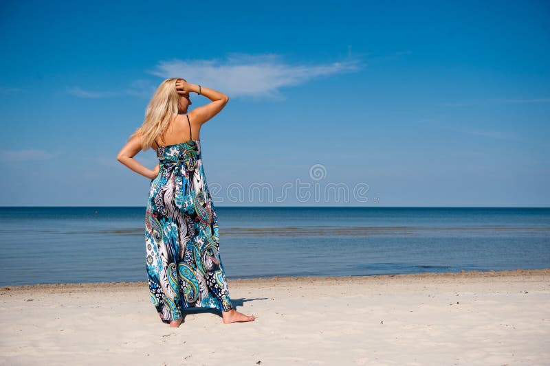 summer woman near sea on the beach