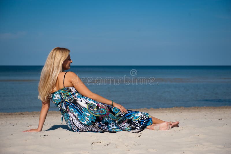summer woman near sea on the beach