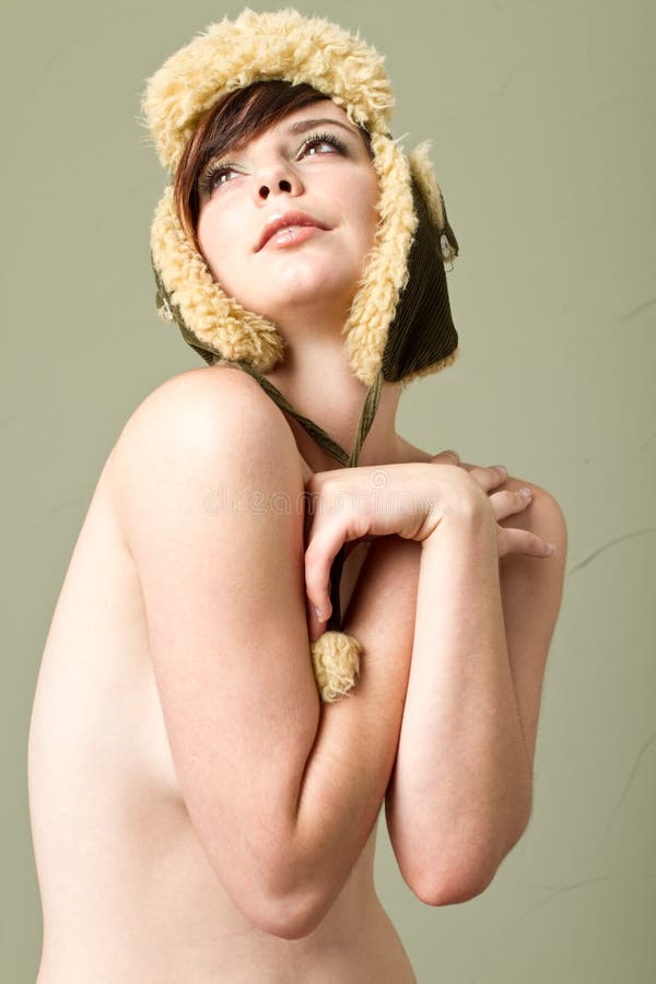 topless woman wearing hat