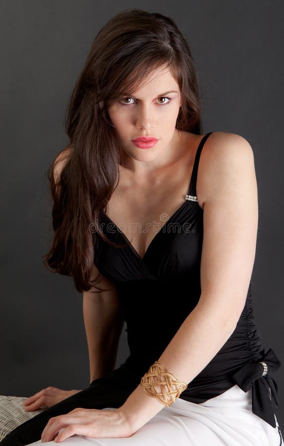 Woman in Black Dress stock image. Image of flirt, coquettish - 20493693