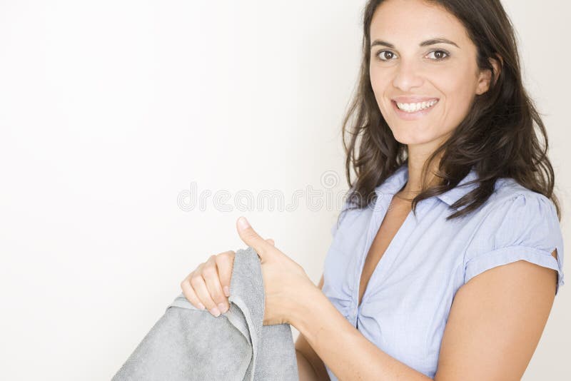 woman drying hands with a towel