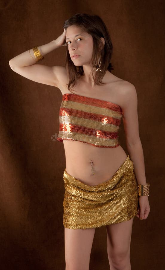 Woman in Flashy Gold Outfit