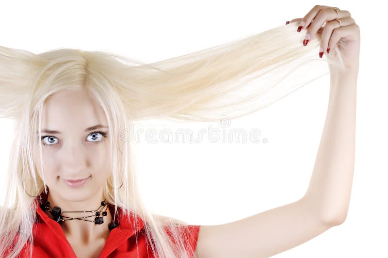 woman holds her long white hair