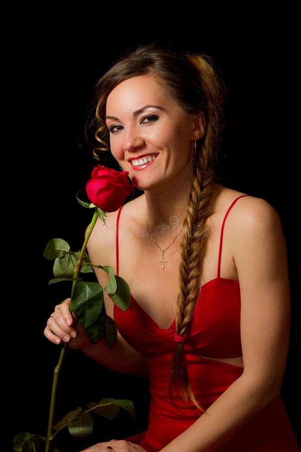 woman in red with a flower