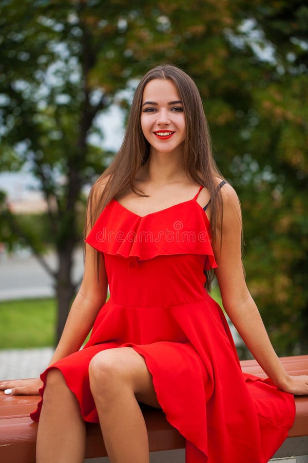 Brunette in red dress