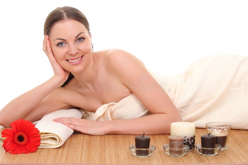 Beautiful woman relaxing in spa. isolated on white stock photo Beautiful woman relaxing in spa. isolated on white stock photo