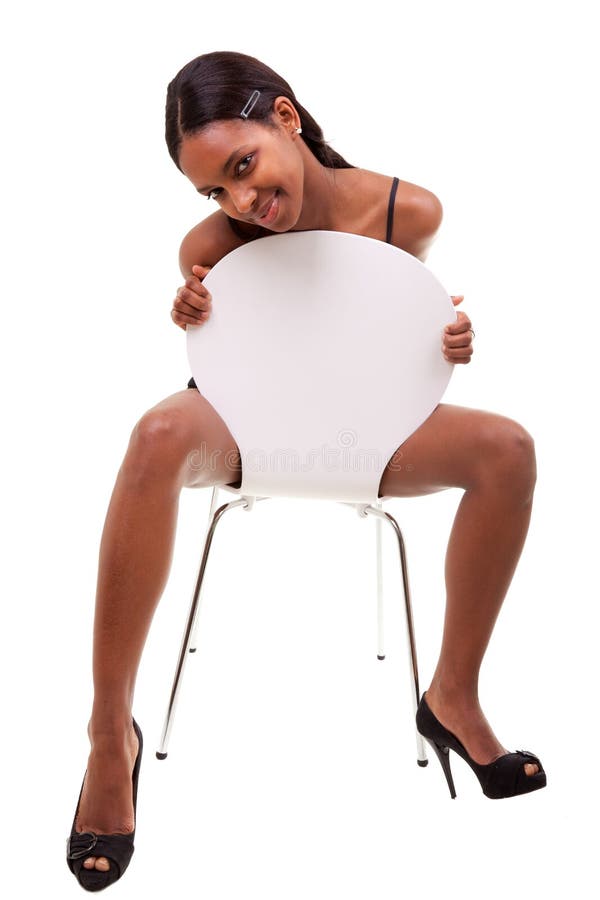 Young Black Woman Posing in Chair Stock Image picture