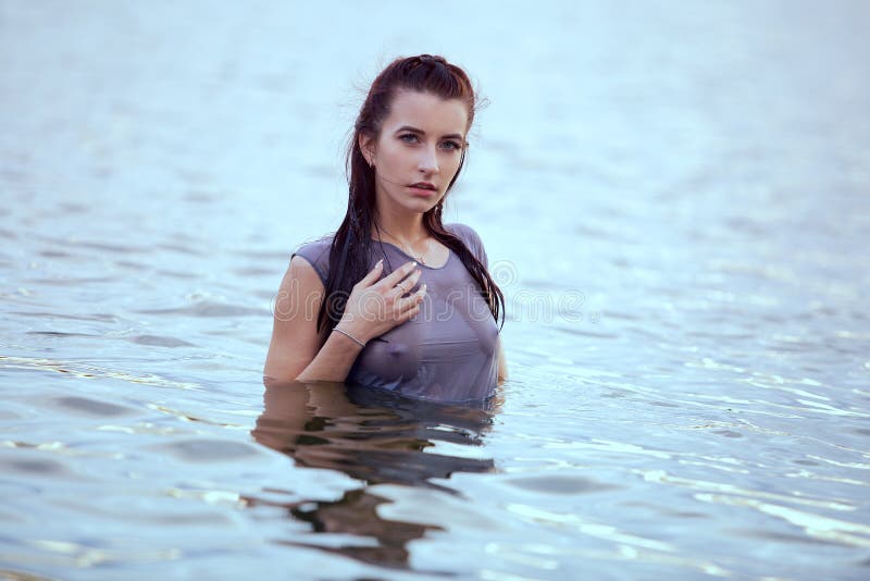 Young Woman Stands In A Wet Tank Top In The River Stock Image Image Of Adult Bank 184512857 