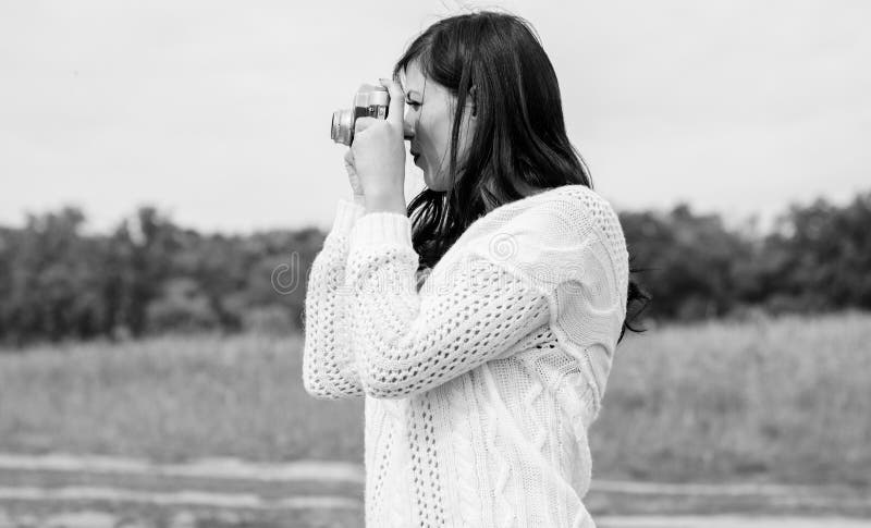 Young Girl in Knitted with a Camera Clothes Outdoor Portrait Stock Photo picture photo image