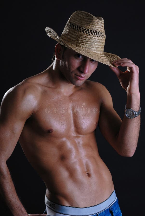 young male in hat and jeans