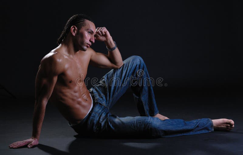 young male in hat and jeans