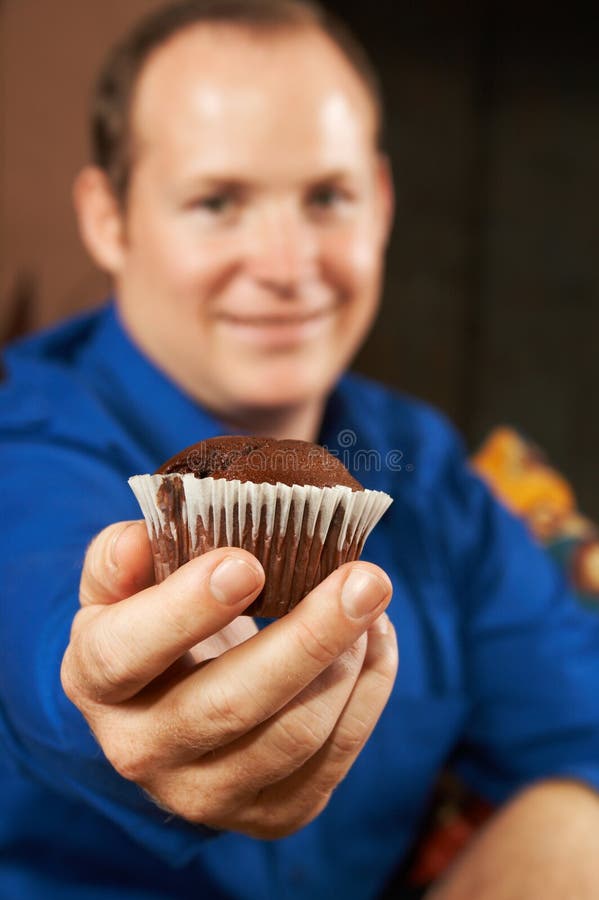 young man with muffin