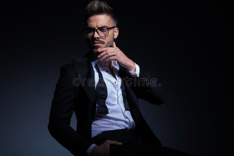 Young Man Wearing Tuxedo and Glasses is Thinking Stock Image - Image of ...