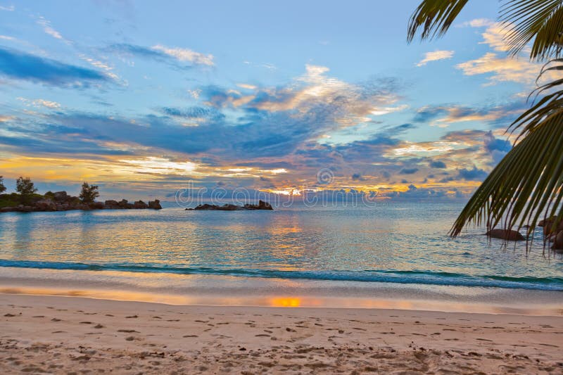 Seychelles Tropical Beach At Sunset Stock Photo - Image of dawn ...