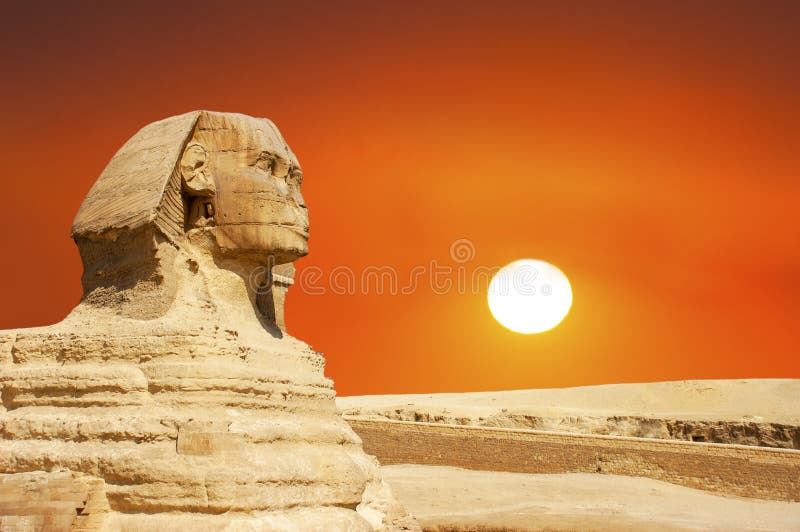 The Sphinx ancient ruins by the Great Pyramid of Giza outside of Cairo, Egypt with a sunrise or sunset. Africa is a popular tourist travel destination for people on vacation or holiday. The Sphinx ancient ruins by the Great Pyramid of Giza outside of Cairo, Egypt with a sunrise or sunset. Africa is a popular tourist travel destination for people on vacation or holiday.